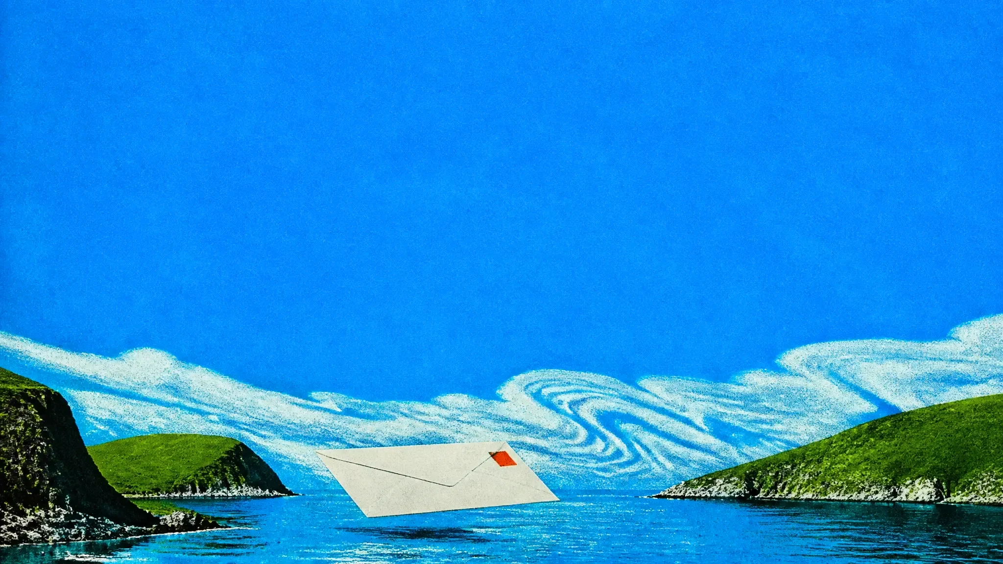 A giant white envelope gliding over a still blue bay