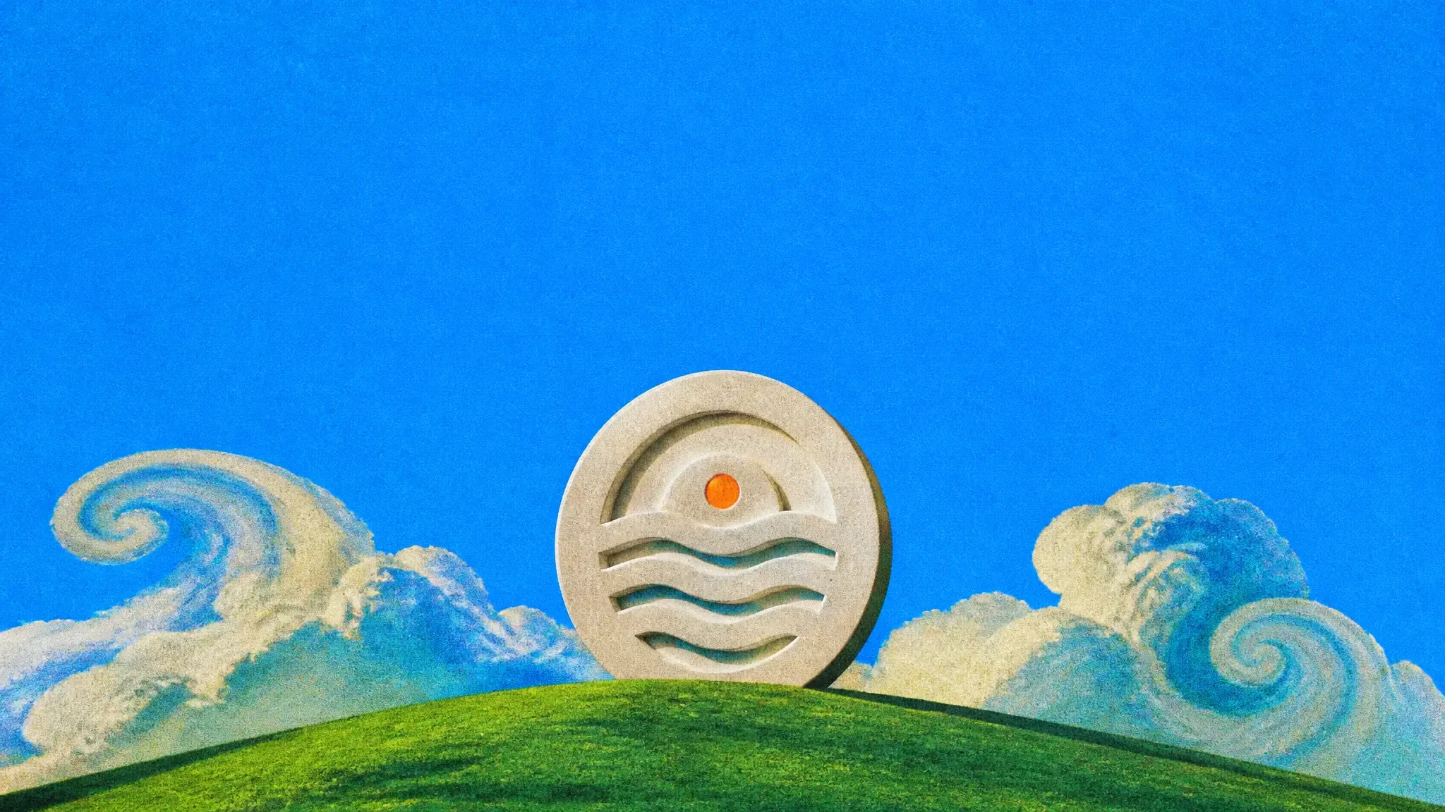 A giant white stone emblem logo standing on a green hill