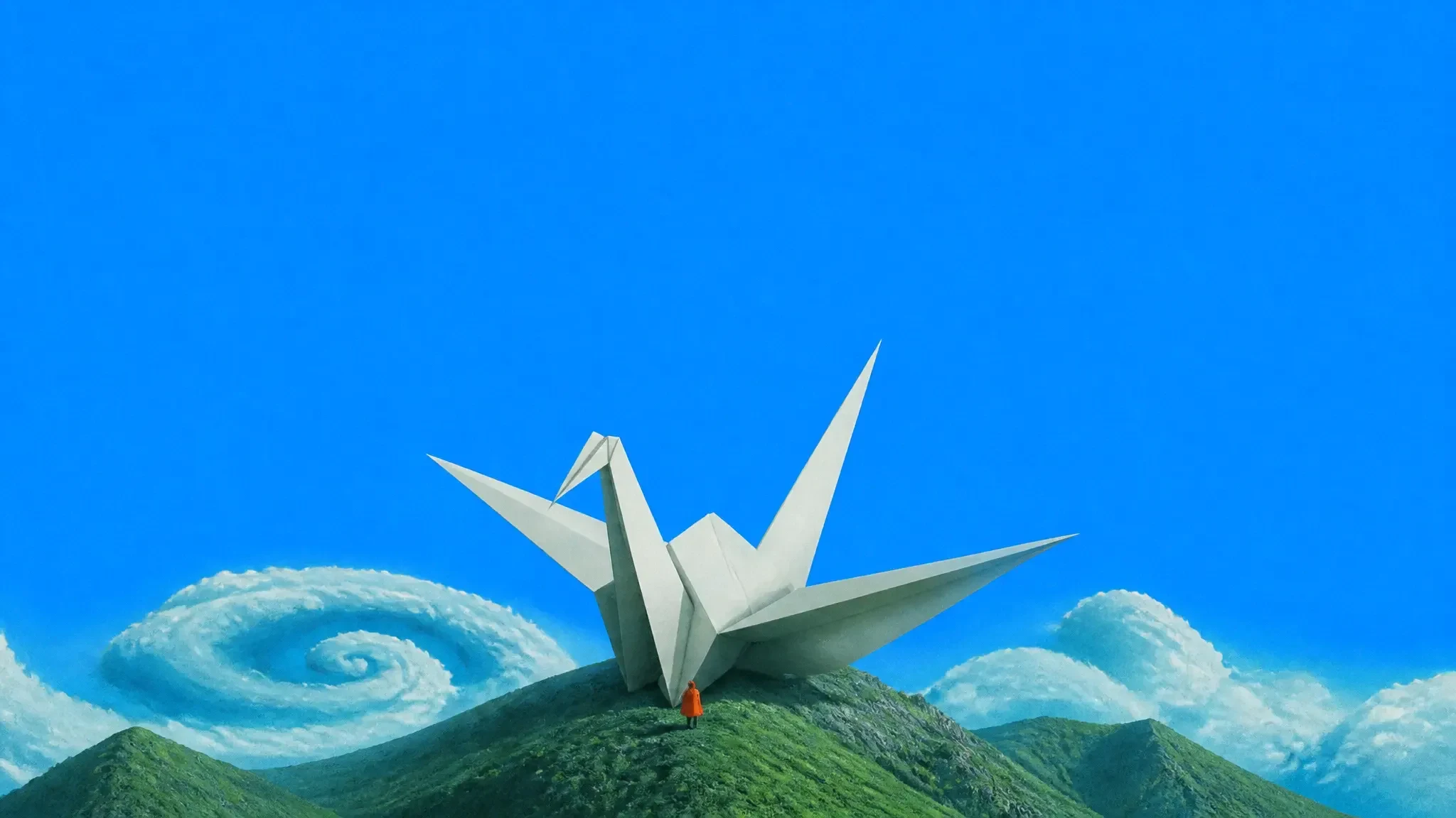 A giant white origami crane on a mountain ridge with a tiny figure below