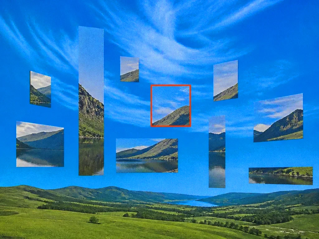 A photo sliced into different sizes above a meadow