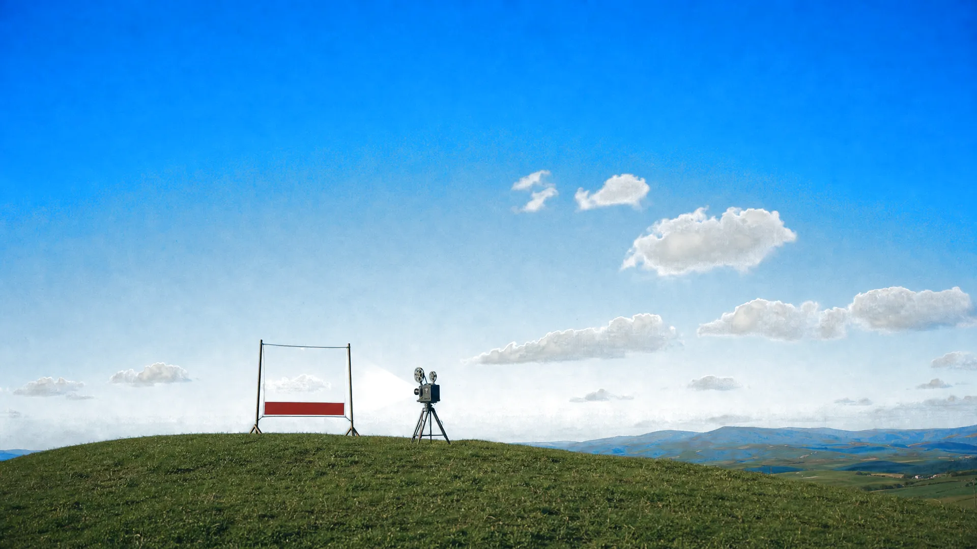 A film projector on a hilltop beside an open screen frame, a blank red caption bar along its foot