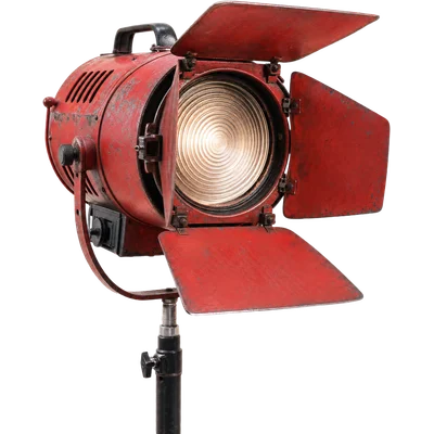 A red film-set spotlight