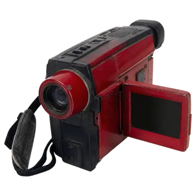 A worn red handheld camcorder