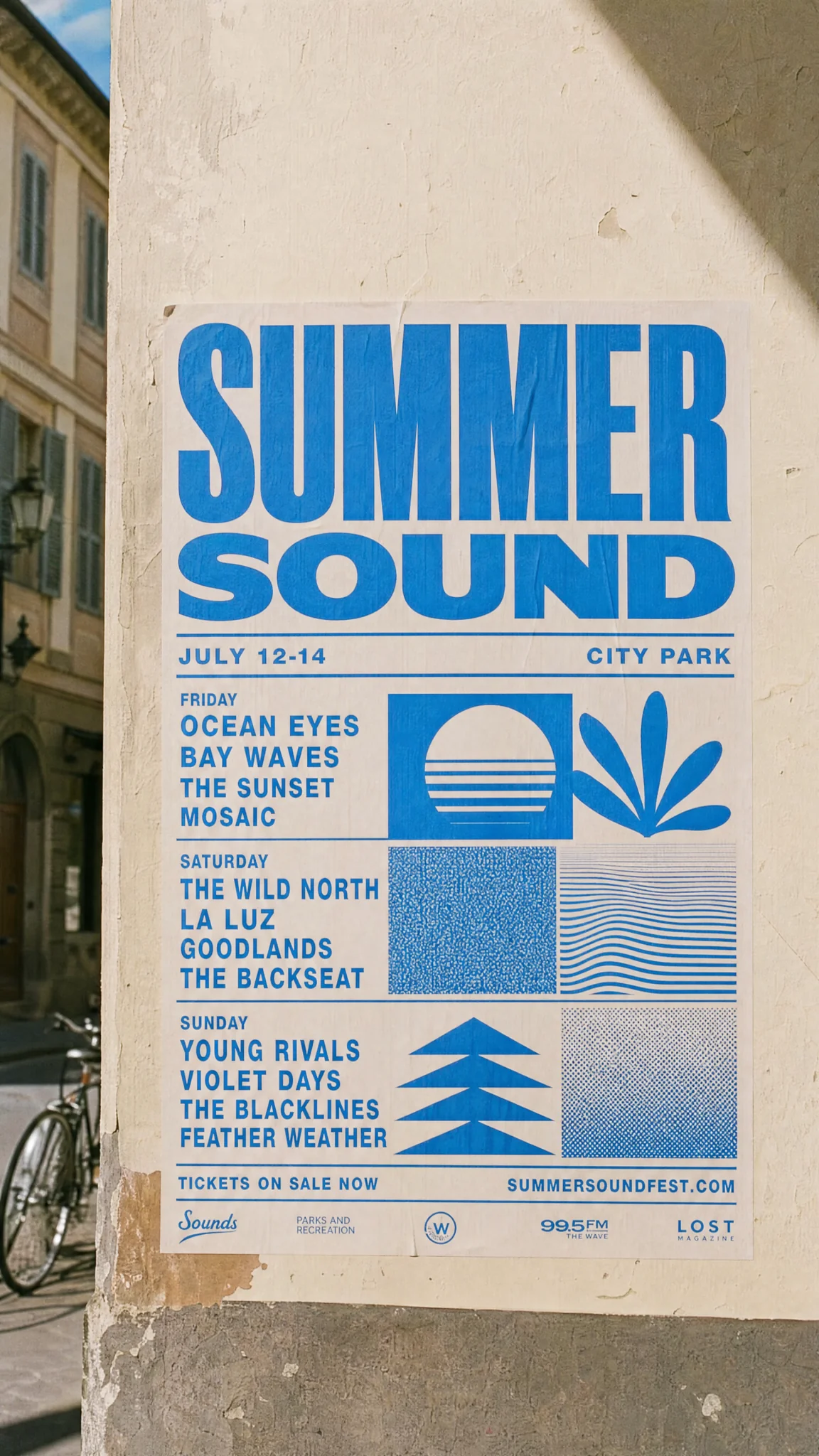 A tall festival poster reading Summer Sound on a street wall