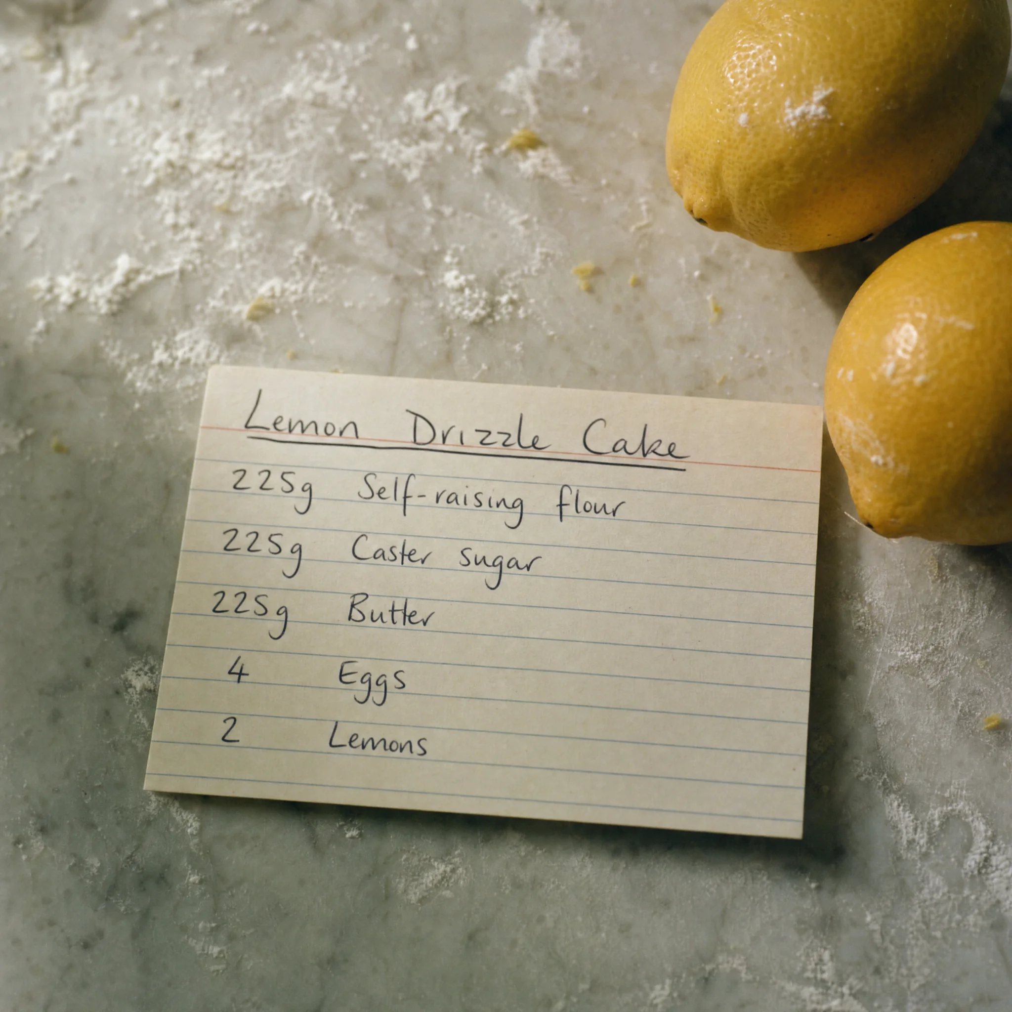 A recipe card for lemon cake, handwritten
