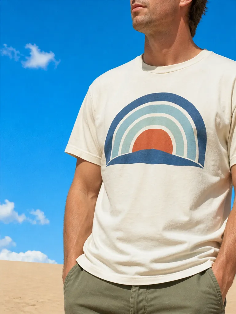 A t-shirt with a retro striped sunset graphic