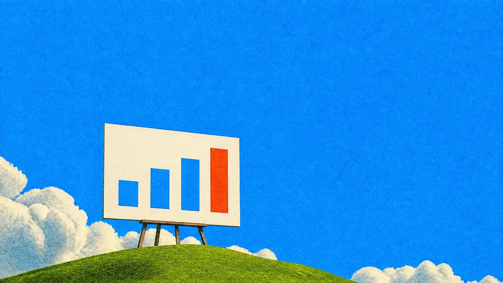 A giant slide with quarterly bars on an easel on a green hill