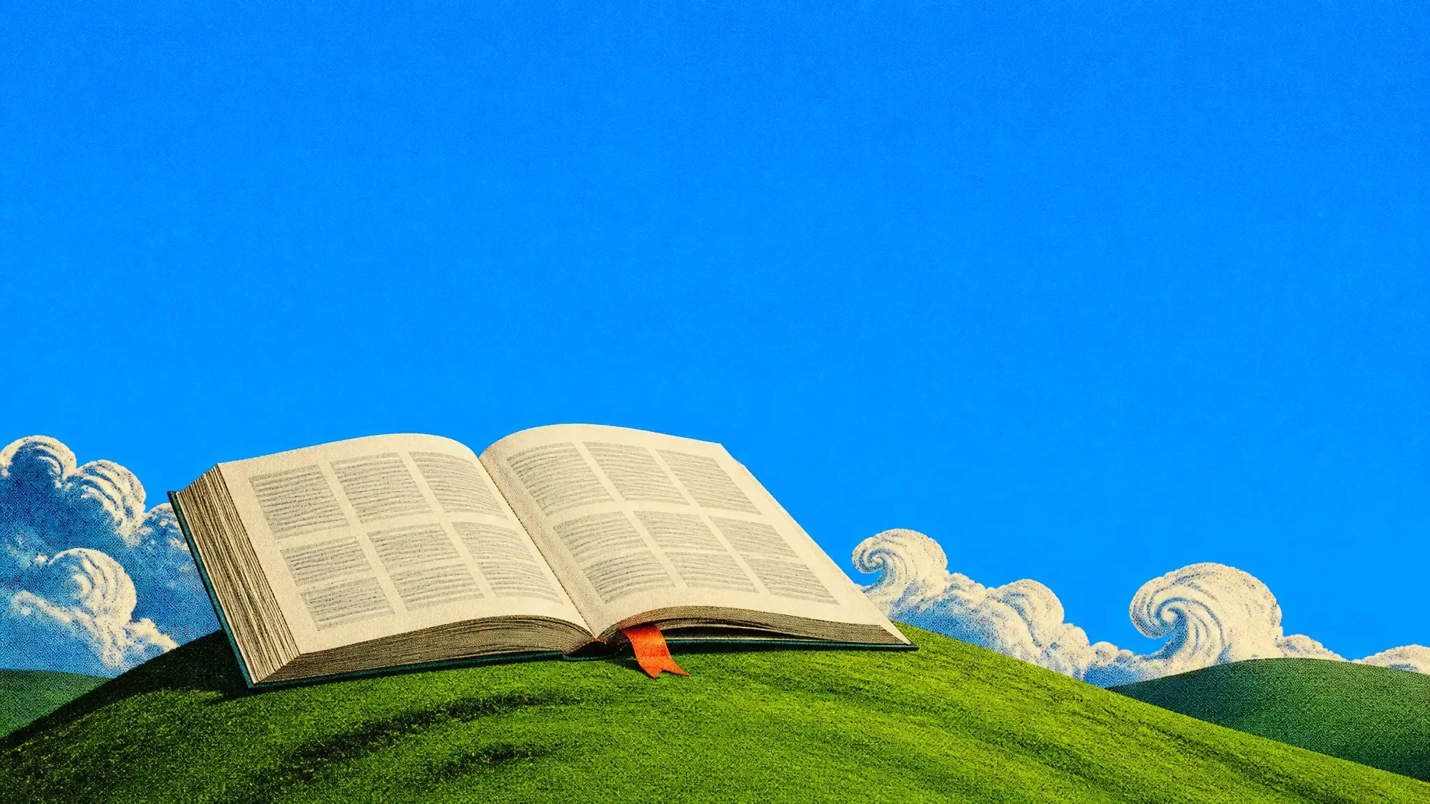 A giant open book of tidy pages lying on a green hill